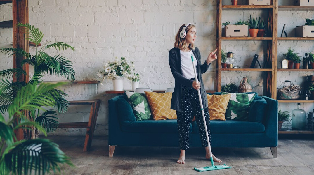 woman cleaning home interior